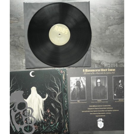 A Monumental Black Statue - The Touch Of The Moon With The Golden Veil